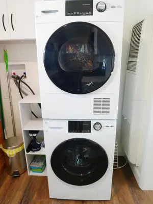 a white washer and dryer in a room at Private Studio - King Bed - Wifi in Arvada