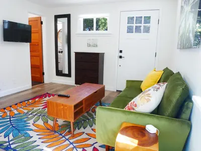 a living room with a couch and a coffee table at Private Studio - King Bed - Wifi in Arvada