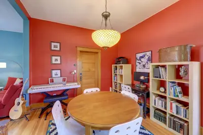 a dining room with a table and a keyboard at Home in Downtown Idaho Springs 2022-01 in Idaho Springs