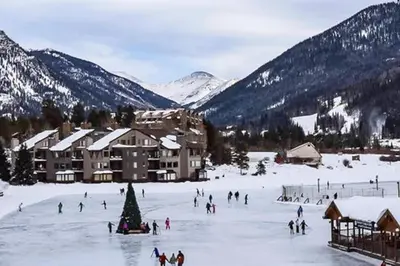 a group of people on a ski slope in the snow at Buffalo Ridge G214 in Silverthorne