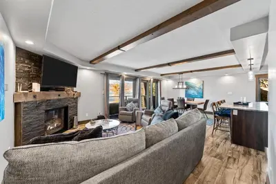a living room with a couch and a fireplace at Corinthian Circle - Dillon in Dillon