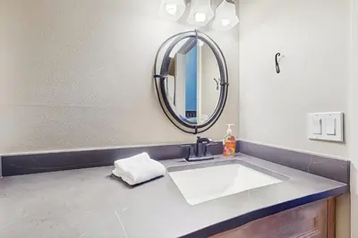a bathroom with a sink and a mirror at Fraser's Mountain Fantasy in Fraser