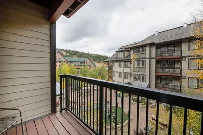 a balcony with a view of a building at Premium Unit 3519- Fraser Crossing Founders Pointe condo in Winter Park