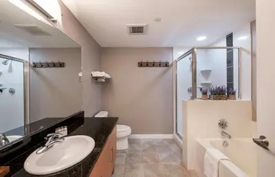 a bathroom with a sink and a toilet and a shower at Premium Unit 3519- Fraser Crossing Founders Pointe condo in Winter Park