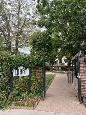 a sign that says jobbey next to a brick wall at Affordable & Chic RiNo/LoDo/Dtown Loft- Walkable in Denver