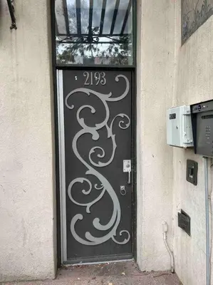 a black door with a design on it at Affordable & Chic RiNo/LoDo/Dtown Loft- Walkable in Denver