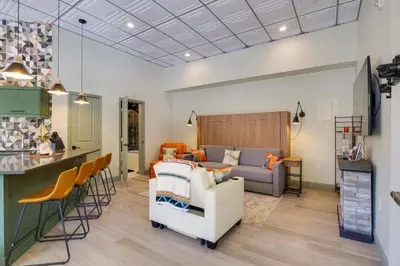 a living room and kitchen with a couch and a table at Ski Shuttle Access Studio 2 Mi to Keystone Slopes in Keystone
