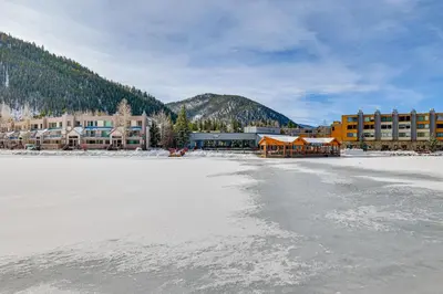 an ice rink in front of a building with a mountain at Ski Shuttle Access Studio 2 Mi to Keystone Slopes in Keystone