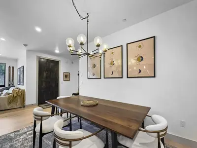 a dining room with a wooden table and chairs at 541 Center Circle 3Br 3,5Ba townhouse in Silverthorne