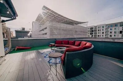 a couch sitting on the roof of a building at Golden Triangle Townhome at Downtown Denver in Denver
