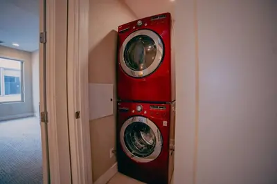 a red washer and dryer in a room at Golden Triangle Townhome at Downtown Denver in Denver