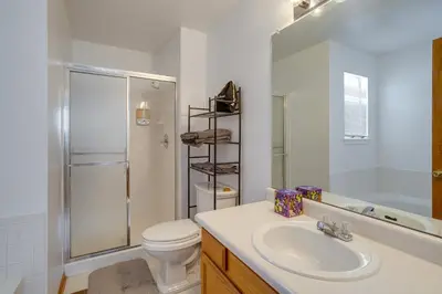 a bathroom with a sink and a toilet and a shower at Patio, Grill, Yard Pet-Friendly Denver Home! in Aurora