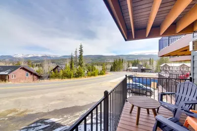 a porch with chairs and a view of a road at Winter Park Townhome with Hot Tub, Half Mi to Dtwn! in Winter Park