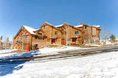 a log cabin in the snow with a road at Spacious Fraser Gem 7 Mi to Winter Park! in Fraser