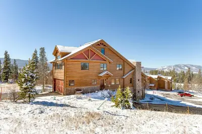 a log home in the winter with snow at Spacious Fraser Gem 7 Mi to Winter Park! in Fraser