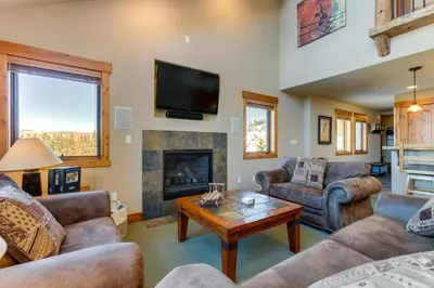 a living room with couches and a fireplace at Spacious Fraser Gem 7 Mi to Winter Park! in Fraser