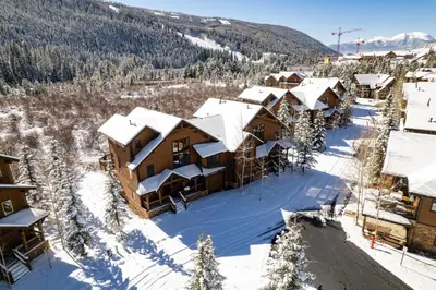 an aerial view of a resort with snow covered buildings at 66 Thackwell Lane townhouse in Keystone
