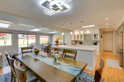 a kitchen and dining room with a table and chairs at Private Hot Tub and Sauna Saulsbury Guest House in Wheat Ridge