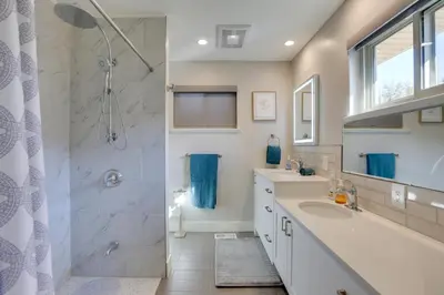 a bathroom with a sink and a shower at Private Hot Tub and Sauna Saulsbury Guest House in Wheat Ridge