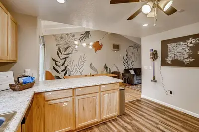 a kitchen with a ceiling fan and a counter top at Close to Denver & Golden - Perfect for Groups in Arvada