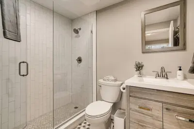 a bathroom with a shower and a toilet and a sink at Close to Denver & Golden - Perfect for Groups in Arvada