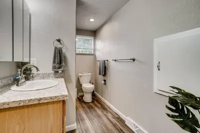 a bathroom with a sink and a toilet at Close to Denver & Golden - Perfect for Groups in Arvada