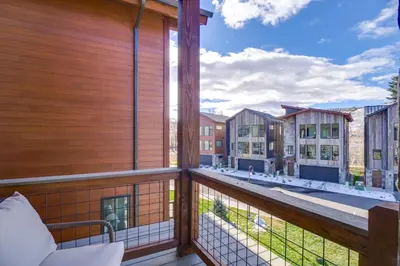 a balcony with a view of the city at Ski, Hike and Relax Fireside Silverthorne Getaway! in Silverthorne