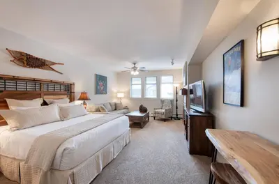 a bedroom with a large bed and a television at Premium Unit 4643- Fraser Crossing Founders Pointe condo in Winter Park