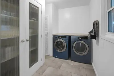 a laundry room with a washer and dryer at Spacious home near Anschutz/DIA in Aurora