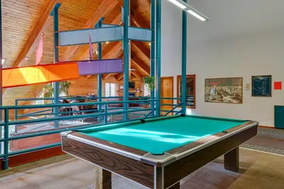 a pool table in a room with a ceiling at Heated Pool Access and Near Skiing Colorado Retreat in Silverthorne