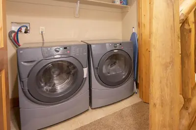 a washing machine and a washer and dryer in a room at Antler Way at Lakota,,,, townhouse in Winter Park