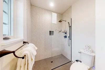 a bathroom with a shower and a toilet at Mountain Sky in Granby