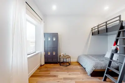 a bedroom with a bunk bed and a window at Mountain Sky in Granby