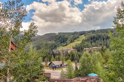 an aerial view of a village in the mountains at Mountainside Majesty in Keystone