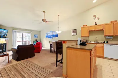 a kitchen and living room with a living room at 2BR Condo - Ideal Hub for Year-Round Fun in Silverthorne