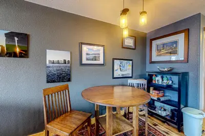 a dining room with a table and two chairs at La Rive Del Lago 302 in Dillon
