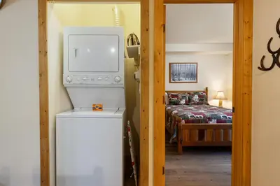 a bedroom with a bed and a television in a room at 2656 Tenderfoot Lodge condo in Keystone