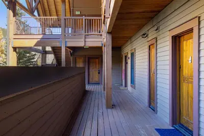 a deck on the side of a house at 2656 Tenderfoot Lodge condo in Keystone