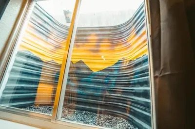 a view of a window with a curtain in it at Windsor Retreat Private Basement Suite in Denver