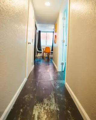 an empty hallway with a hallway at Windsor Retreat Private Basement Suite in Denver