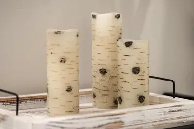 a group of three bamboo cylinders on a table at Modern Granby Wonder by Leavetown Vacations in Granby