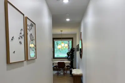 a hallway with a dining room with a table at Seasons 1889 - Keystone in Keystone