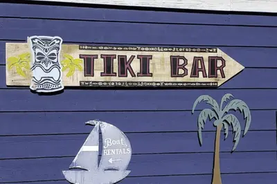 aiki bar sign on the side of a purple building at Seasons 1889 - Keystone in Keystone