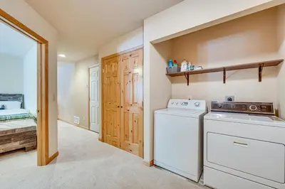 a laundry room with a washer and dryer at Less Than half Mi to Marina Grand Lake Getaway! in Grand Lake
