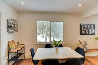 a dining room with a table and chairs and a window at 6 Mi to Staunton State Park Conifer Home with Deck in Conifer