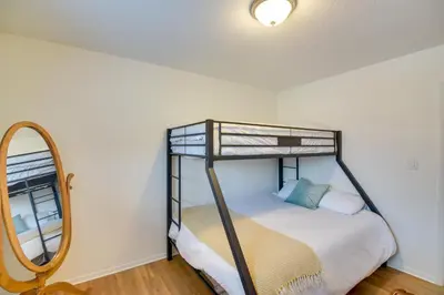 a bedroom with a bunk bed and a mirror at 6 Mi to Staunton State Park Conifer Home with Deck in Conifer