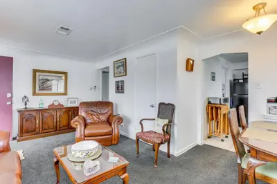 a living room with a couch and chairs and a table at Dog-Friendly Denver Apartment with Shared Yard! in Denver