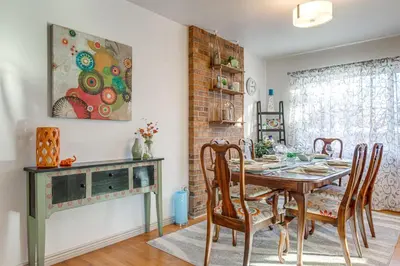 a dining room with a table and chairs at 4 Mi to Hwy Access for Mtn Fun Family Getaway! in Lakewood