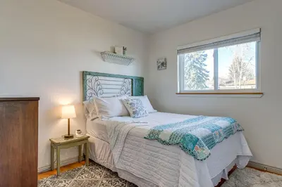 a bedroom with a bed and a window at 4 Mi to Hwy Access for Mtn Fun Family Getaway! in Lakewood