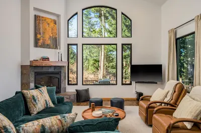 a living room filled with furniture and a fireplace at Stay in Evergreen - Denver Mountain Escape in Evergreen